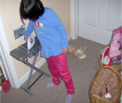 Two girls playing puzzle